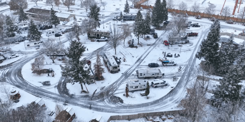 an RV park in the winter full of campers wondering "how much snow can a camper roof hold?"