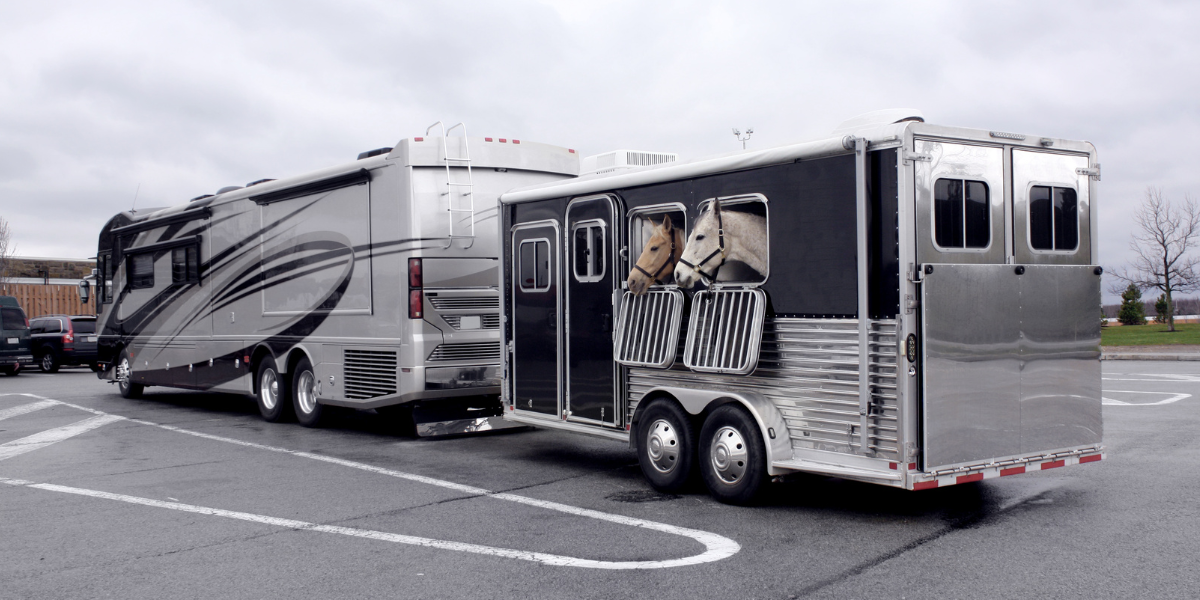 class A motorhome with insurance towing a horse trailer